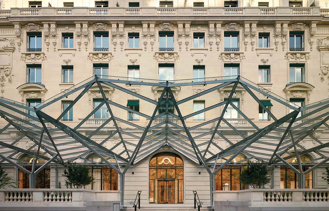 The glass and metal marquee at the front of the Peninsula hotel in Paris