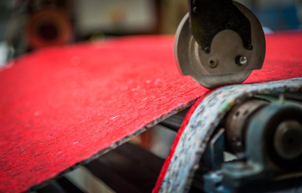 A High Quality Underlay Being Cut To Size By A Machine