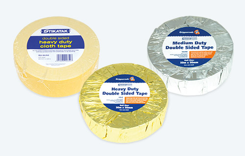 Three different packs of tape on a white background