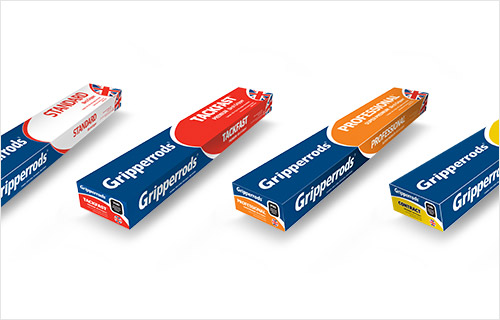 Four Different Packs of Gripperrods Carpet Gripper Rods on a White Background